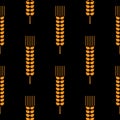 Seamless wheat ear pattern. Golden ears on black background