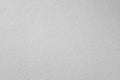 Seamless white rough plaster wall texture background. Abstract backdrop with subtle grain and copy space. Ideal for minimalist Royalty Free Stock Photo