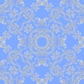 Seamless winter lace pattern on blue background. Paper, wallpaper, bandana print, wrapping design