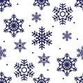 Seamless winter pattern of blue openwork snowflakes Royalty Free Stock Photo