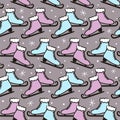 Seamless winter pattern with hand-drawn skates and snowflakes Royalty Free Stock Photo