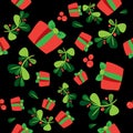 Seamless winter pattern with a red gift boxes and holli berries Royalty Free Stock Photo