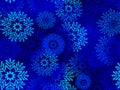 Seamless winter pattern with silhouettes of snowflakes on a dark night blue background Royalty Free Stock Photo