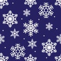 Seamless winter pattern of white openwork snowflakes