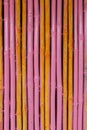 Seamless yellow pink bamboo stick striped pattern