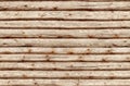 Seamlessly tiling wooden log wall. Royalty Free Stock Photo