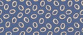 Seamlles Vector Pattern with Ivory Beige Circles on a Glaxy Blue Background.