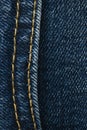 Seams on jeans close-up. Stitching on denim. Close up of blue jeans background. Denim texture Royalty Free Stock Photo