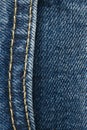 Seams on jeans close-up. Stitching on denim. Close up of blue jeans background. Denim texture Royalty Free Stock Photo