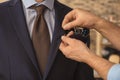 Seamster tailoring suit for client in atelier Royalty Free Stock Photo