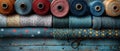 Seamstress's workspace. Set of reels of thread, polka dots cloth, ribbons, buttons, and scissors for sewing and Royalty Free Stock Photo