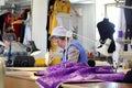 Seamstress working in the sewing workshop.