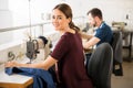 Seamstress working in textile factory Royalty Free Stock Photo