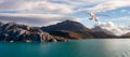 Seaplane Aircraft Flying over the Pacific Ocean Coast. Royalty Free Stock Photo