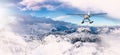 Seaplane flying over the Rocky Mountains. BC, Canada