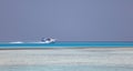 Seaplane gliding on sea water
