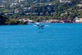 Seaplane Landing on Blue Water