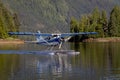 Seaplane landing in a remote cove near Ketchikan, Alaska