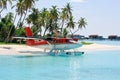 Seaplane near tropical island Royalty Free Stock Photo