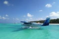 Seaplane ready to take off on blue ocean Royalty Free Stock Photo