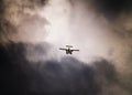 Seaplane in stormy sky Royalty Free Stock Photo