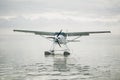 The seaplane is on the surface of the water. Mauritius. Royalty Free Stock Photo