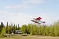 Seaplane taking off from river