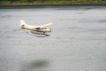 Seaplane about to land on the water.