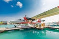 05.06.2018 - Ari Atoll, Maldives: Exotic scene with seaplane on Maldives sea landing. Vacation or holiday in Maldives concept back Royalty Free Stock Photo