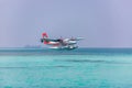 12.15.2015: Seaplane at tropical beach resort. Luxury summer travel destination with seaplane in Maldives islands