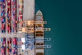 Seaport terminal storage containers and shipping cargo containers loading and unloading aerial view Royalty Free Stock Photo