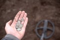 Search for artifacts with a metal detector and a shovel