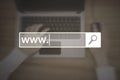 Search bar with www text and laptop Royalty Free Stock Photo