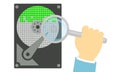 Search for bugs on the hard disk. A hand with a magnifying glass finds an error.