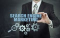 Search engine marketing - SEM concept. Businessman or programmer is focused to improve SEM and web traffic. Royalty Free Stock Photo