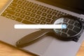 Search engine optimization and notebook browsing bar internet data information networking concept Royalty Free Stock Photo