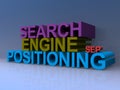 Search engine positioning on blue Royalty Free Stock Photo