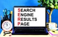 Search engine results page, SERP. The inscription on the computer monitor screen.