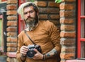 Search for inspiration. hipster man with beard use professional camera. photographer retro camera. journalist is my