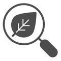 Search with leaf solid icon. Magnifying glass and plant vector illustration isolated on white. Eco search glyph style