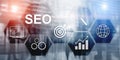 Searching Engine Optimizing SEO on abstract business background. Mixed media.