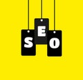 searching engine optimizing SEO tag with yellow background image Royalty Free Stock Photo