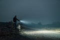 Searching with flashlight in outdoor Royalty Free Stock Photo