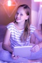 Beautiful nice blond girl with her tablet Royalty Free Stock Photo