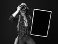 Tourist woman with blackboard and DSLR camera taking photo Royalty Free Stock Photo