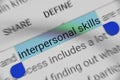 Word `Interpersonal Skills` selected and highlighted digitally on mobile display screen