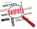 Searching for Secrets - Magnifying Glass Finds Clues Royalty Free Stock Photo