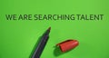 We Are Searching Talent message with a marker