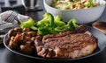 Seared ribeye steak with broccoli and sauteed mushrooms