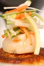 Seared scallop with vegetables on crab cake Royalty Free Stock Photo